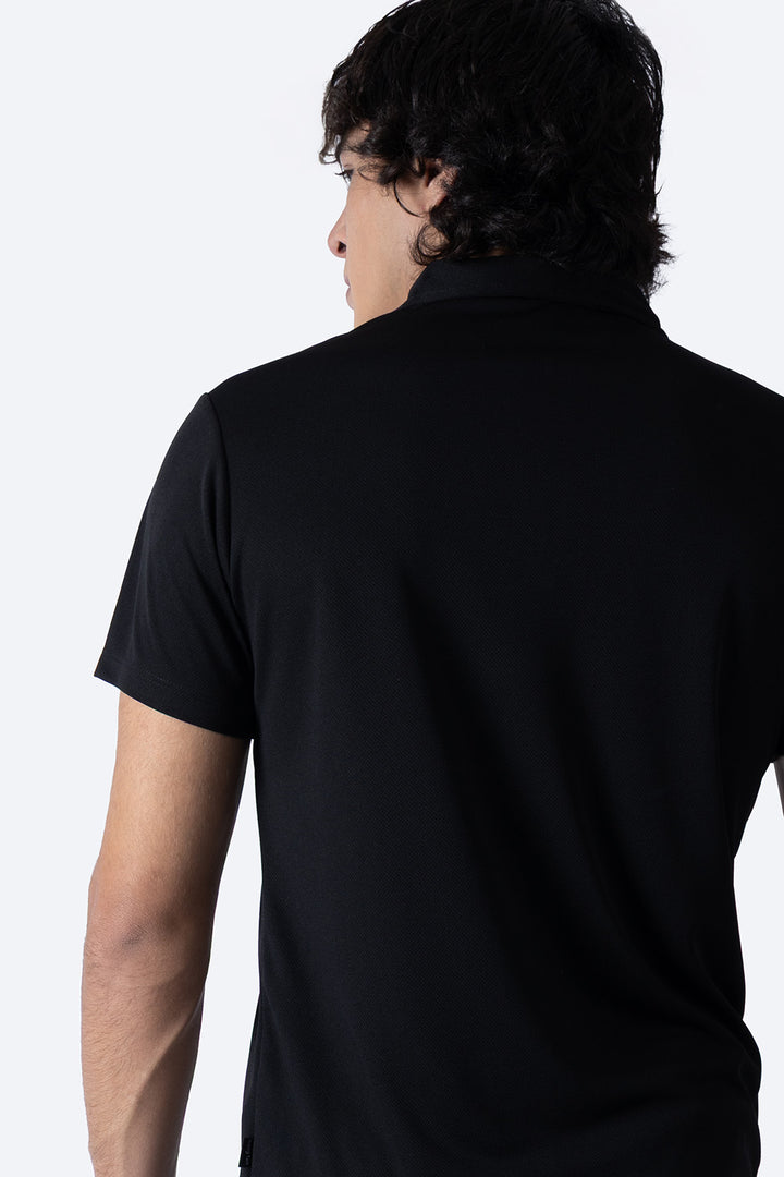 Polo deportiva negra manga corta - Hang Ten