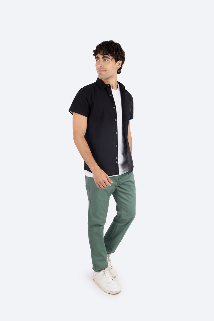 Camisa negra con bolsillo -Hang Ten