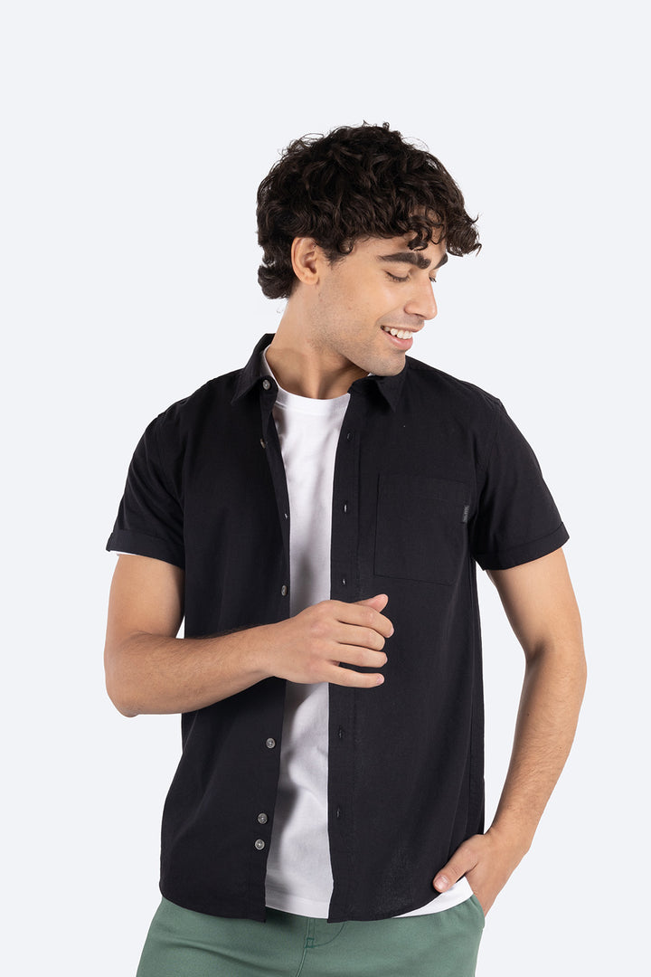 Camisa negra con bolsillo -Hang Ten