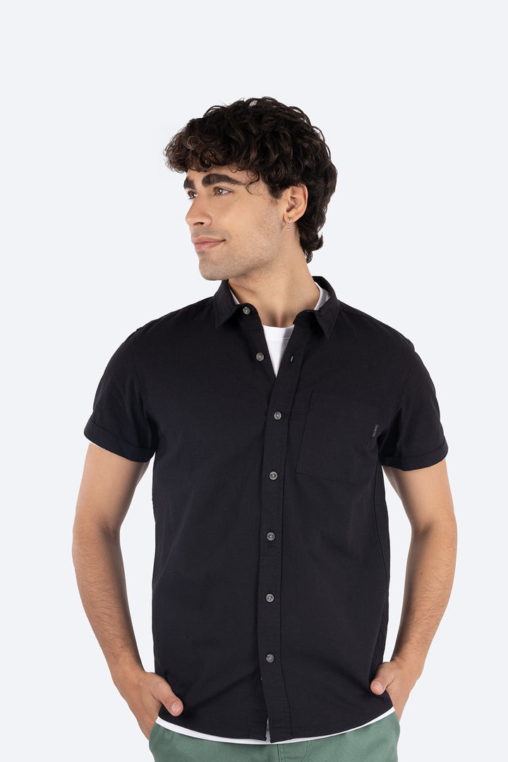 Camisa negra con bolsillo -Hang Ten