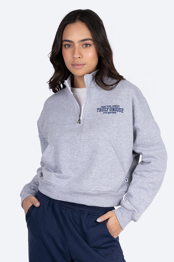 Sudadera gris con medio cierre