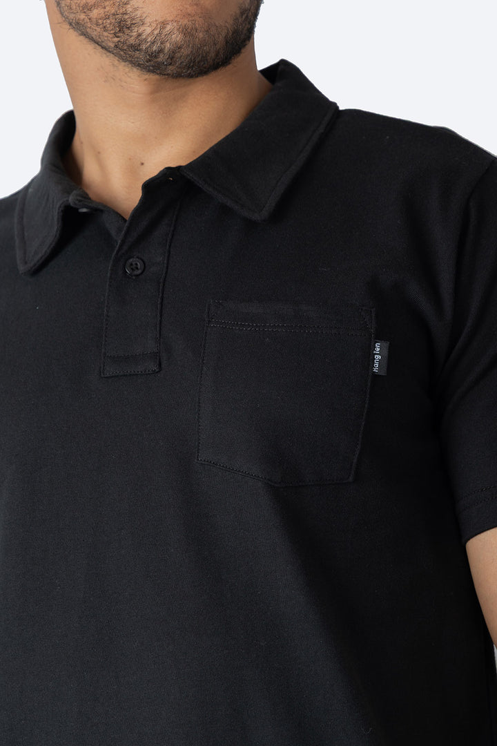 Polo básica negra con bolsa - Hang Ten