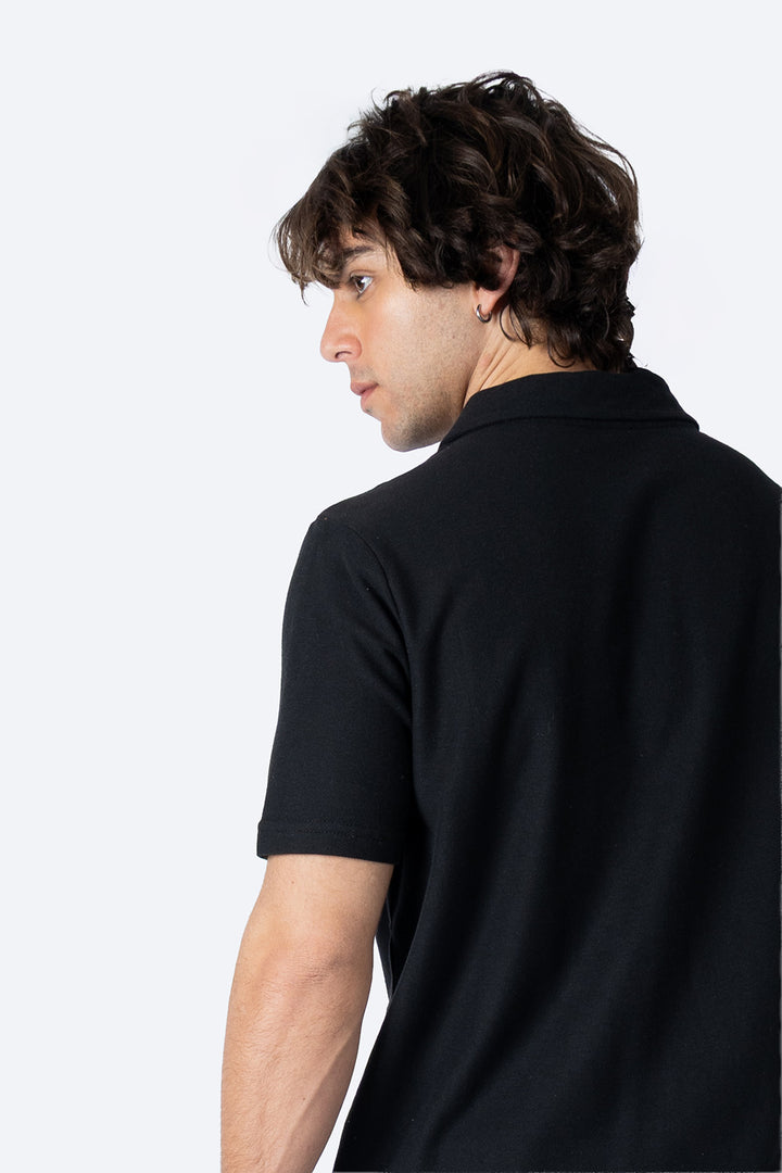 Polo pique básica negra con bolsa  - Hang Ten