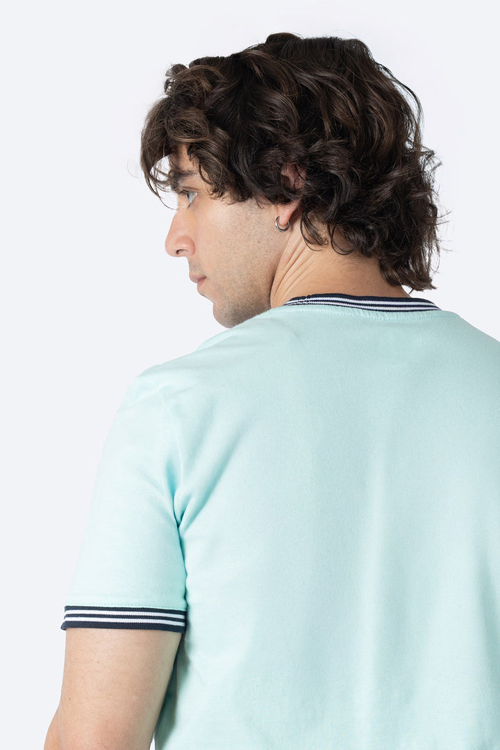 Playera aqua bies a contraste negro - Hang Ten 