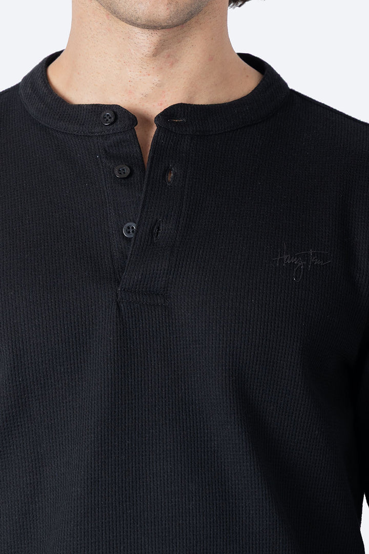 Player manga larga con textura negra - Hang Ten 