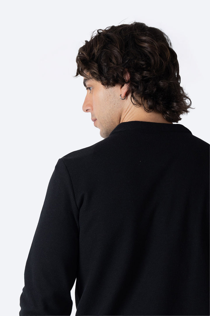 Player manga larga con textura negra - Hang Ten 