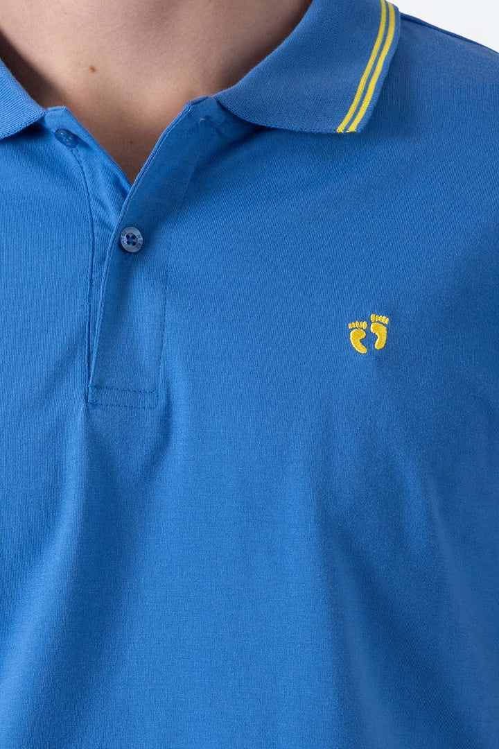Polo chifón azul filos a contraste amarillo - Hang Ten 
