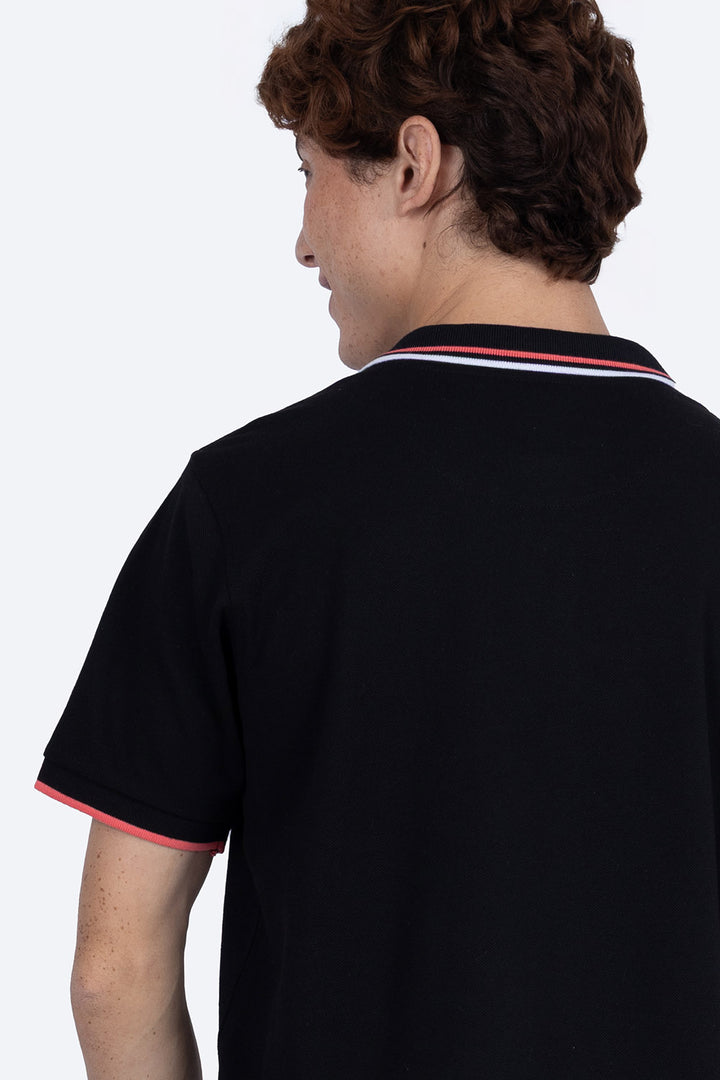 Polo piqué negra filos contraste blanco con rosa - Hang Ten 